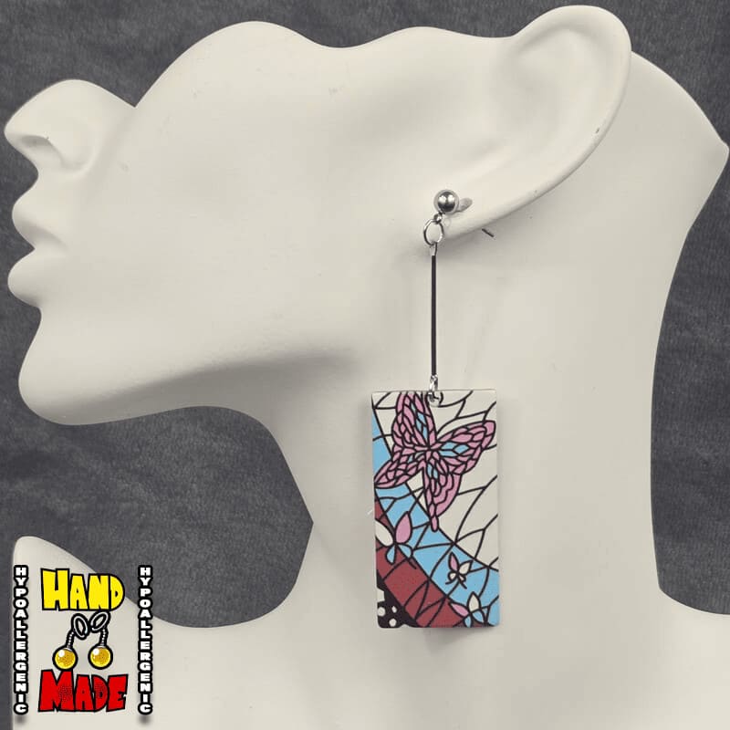 Acrylic Mosaic Butterfly Hanafuda Anime Earrings shown on a white molded display, featuring detailed butterfly mosaic charms on silver dropped posts.