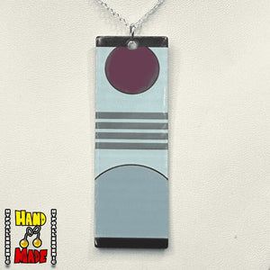 Acrylic Triple Stripe Rising Sun Hanafuda Anime Necklace displayed on a white stand, featuring a striped charm on a sterling silver snake chain.