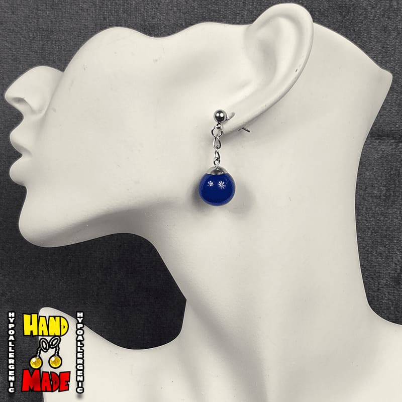 A pair of blue agate sphere earrings on a mannequin head, with the earring details and a 'Handmade' seal visible.