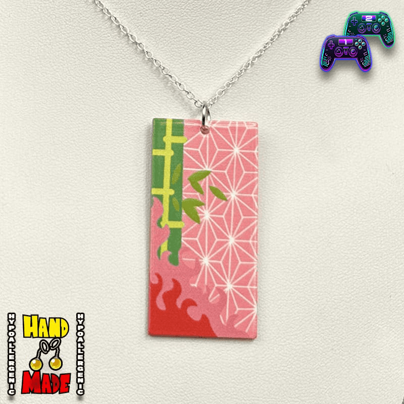 An acrylic Hanafuda card pendant necklace with a character inspired by Nezuko Kamado from Demon Slayer, displayed on a white background with a silver chain.