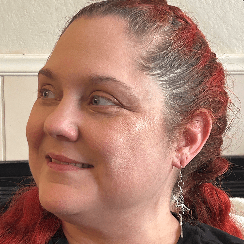 A model image of a model wearing the previously described earrings.