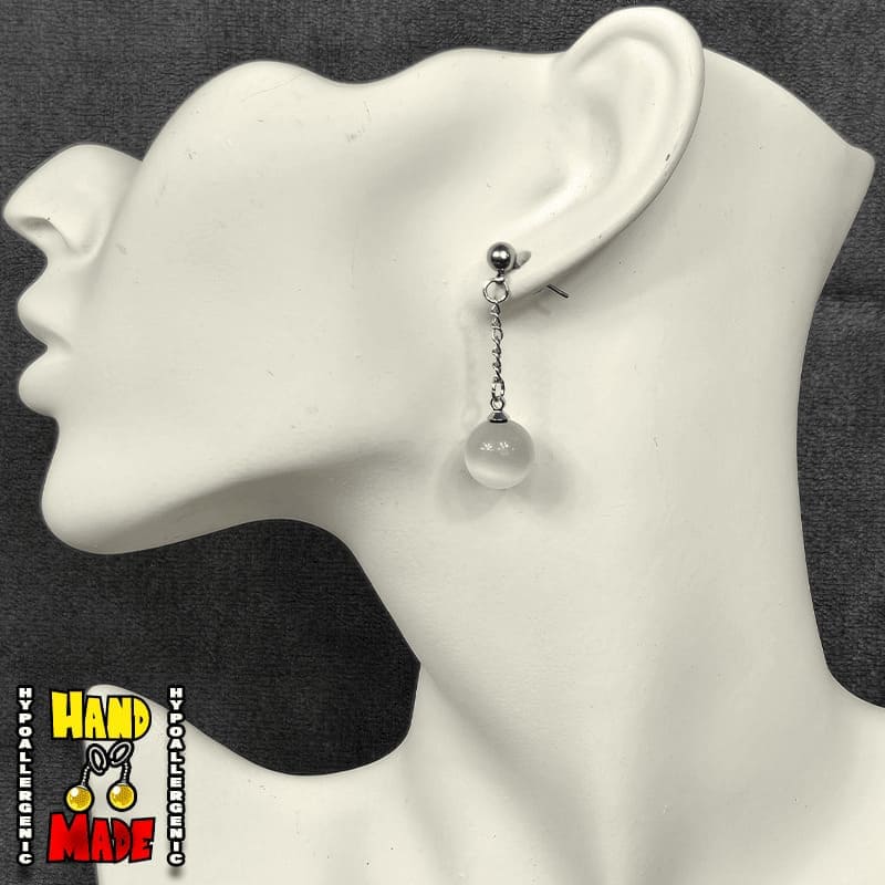 Handmade Ivory Ascension Anime Earrings featuring white agate gemstone spheres on sterling silver dropped posts.