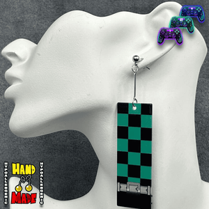 Large Green and Black Checkerboard pattern with a black bottom border, hanging from small silver jewelry extender and silver dropped posts