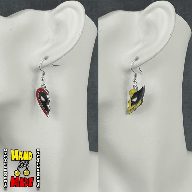 Handmade Masked Duo Friendship Earrings featuring mismatched metal hero mask charms with silver French hook ear wires.