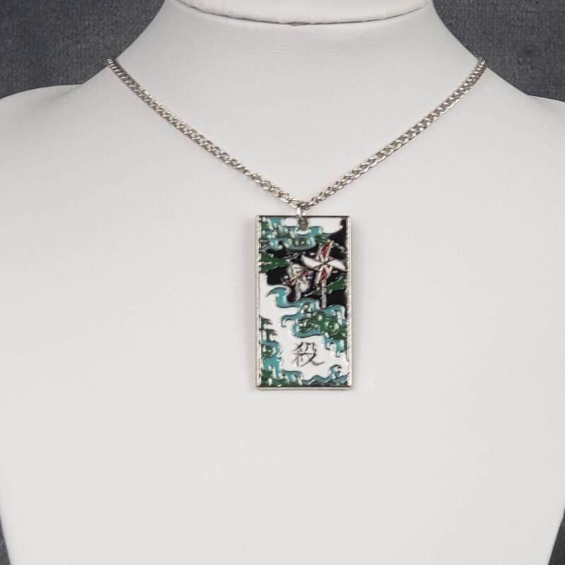 Metal Windmills Hanafuda Anime Necklace displayed on a white flat stand with a silver chain and a windmill-themed metal charm inspired by Sanemi.