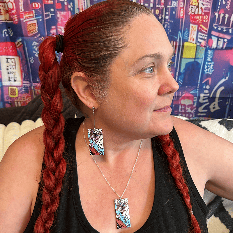 Model wearing the Acrylic Mosaic Butterfly Hanafuda Anime Necklace, showing the vivid butterfly design and lightweight silver chain resting on the chest.