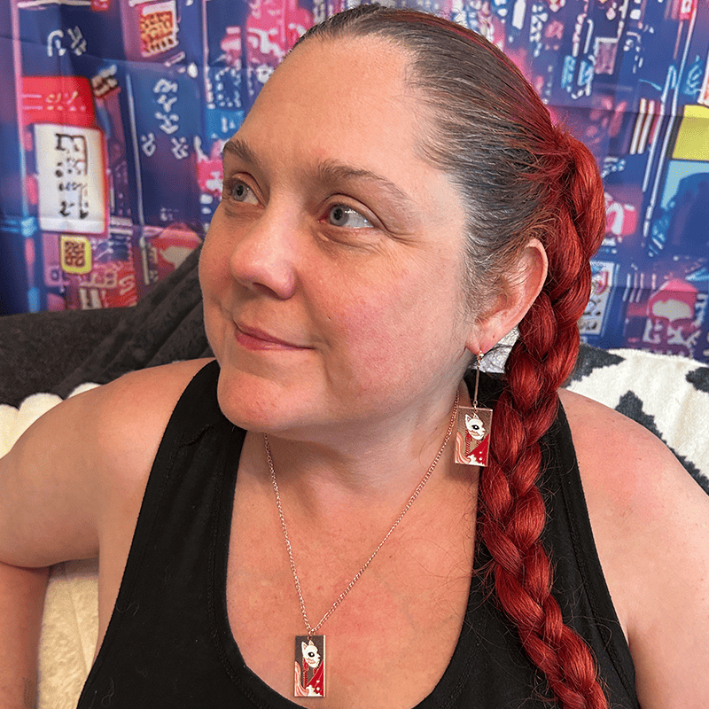 Model wearing the Metal Fox Mask Hanafuda Anime Necklace, showing the polished fox mask charm and rose gold chain resting elegantly on the chest.