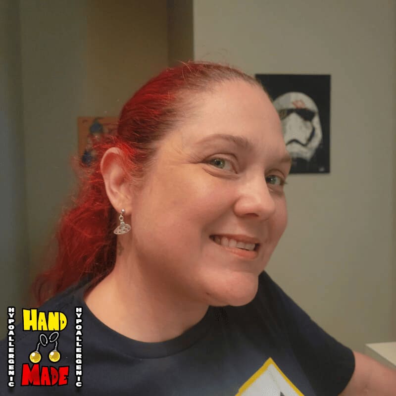 A model image of a model wearing the previously described earrings.