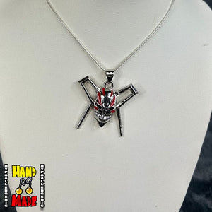 Handmade Phantom Mask Anime Necklace featuring metal mask charm on a silver chain necklace.