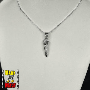 A silver-tone metal charm, in the shape of a finger attached to a hypoallergenic silver-tone chain, displayed on a mannequin neck.