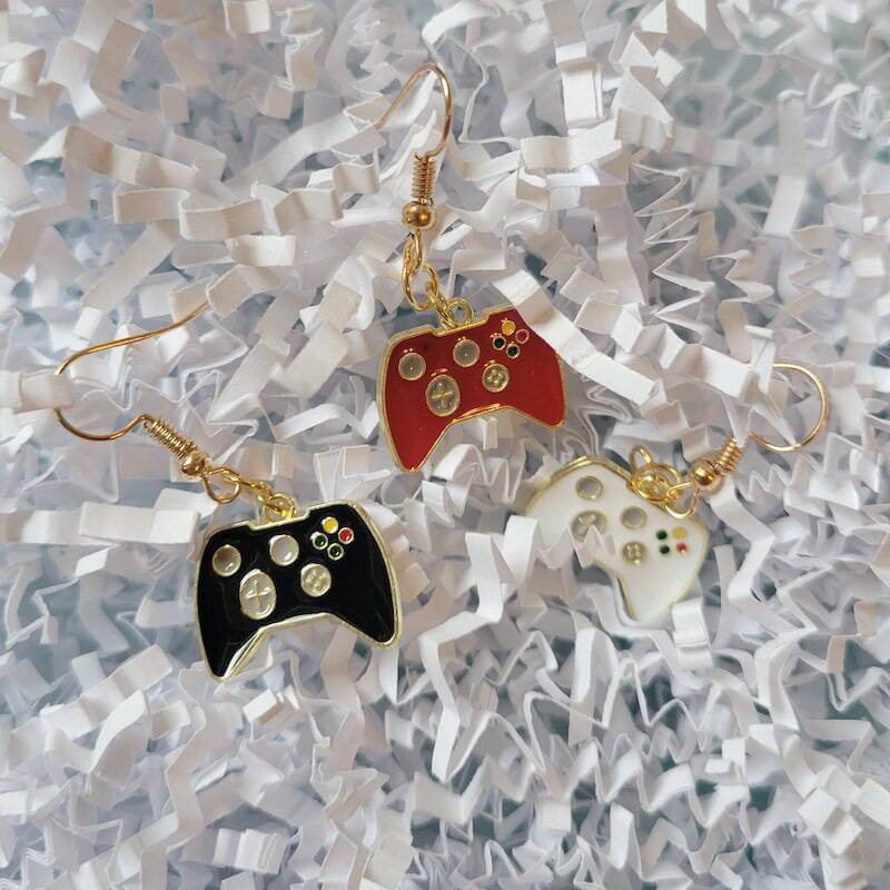 A group image of all 3 controller earrings together.