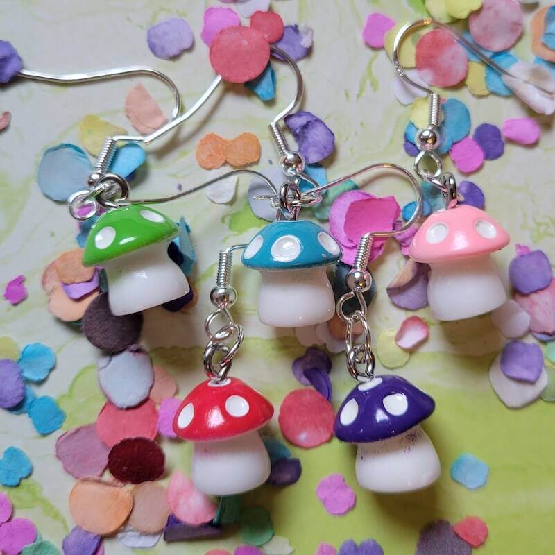 An image showing 5 different styles of our previously described Mushroom Gaming Earrings.
