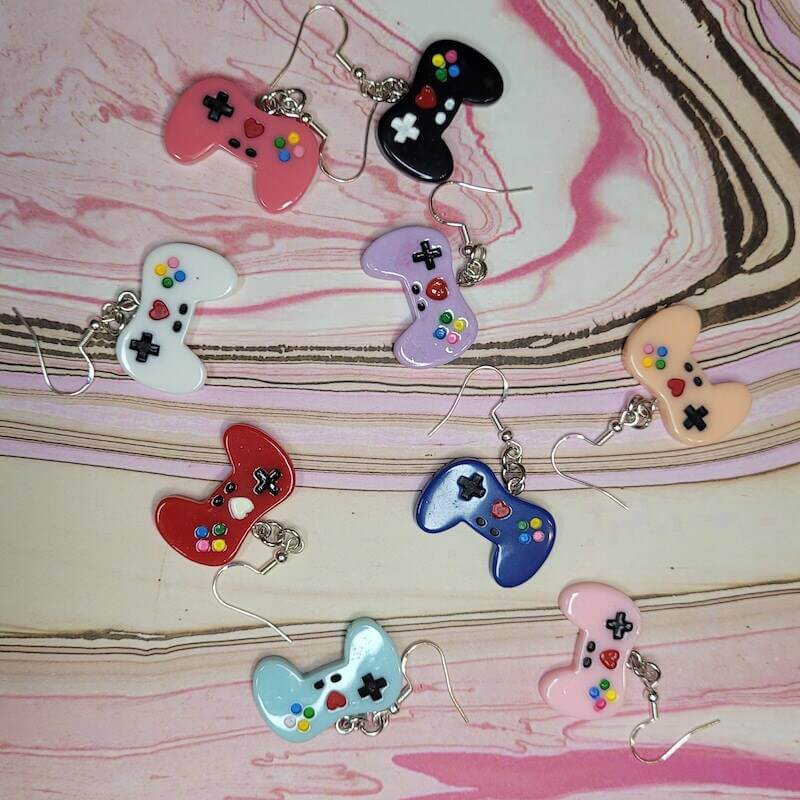 An image displaying all the different styles of our Plastic Controller Gaming Earrings.