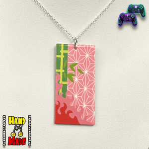 An acrylic Hanafuda card pendant necklace with a character inspired by Nezuko Kamado from Demon Slayer, displayed on a white background with a silver chain.