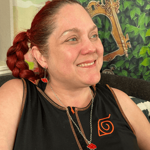 A model image of a model wearing the previously described necklace.