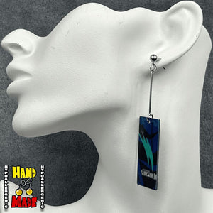 Handmade Small Acrylic Inosuke Hanafuda Anime Earrings based on his profile with primary patterns and belt